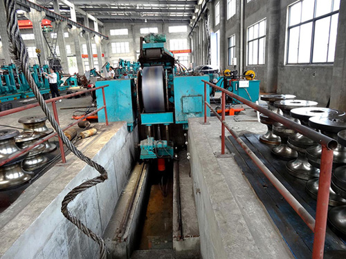 1. Double Cone Un-coiler with Coil Car