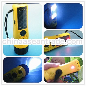 2013 new mulitfunction solar led torch light with mobile charger fm radio