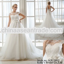 cap sleeves with high neckline and open back wedding dress