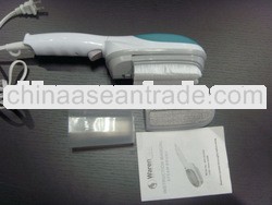 Portable clothes steam brush as seen on tv