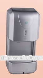 Wall mounted automatic hand dryer with water tray