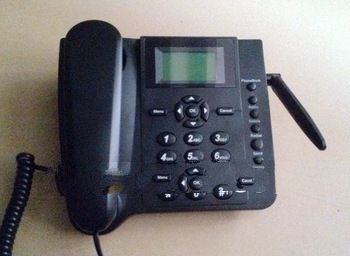 Free shipping SIM card GSM fixed wireless desktop telephone phone with SMS function