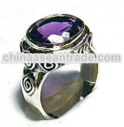 Silver Ring With Oval Ametis And Simple Bun Motif