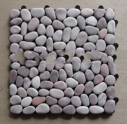 Violet pebbles on plastic