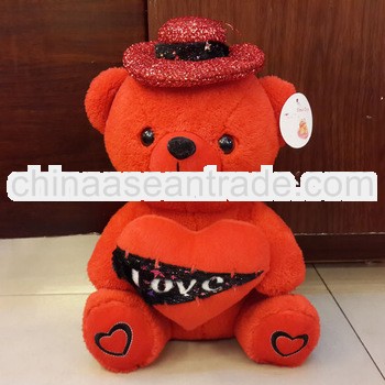 2013 best selling red plush teddy bear with heart for wedding decoration