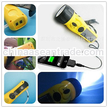 2013 new crank dynamo solar flashlight with charger fm radio