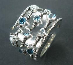 RFMN0029 - Sterling Silver Contemporary Ring with Blue & White Topaz