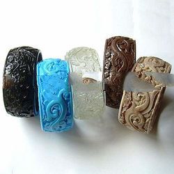 Ethnic motif resin bangles