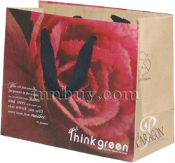 Kraft bag with woven black handle