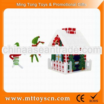 A 3d handmade cross stitch christmas house