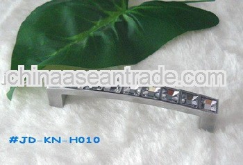 Crystal diamond mounted bridge handle