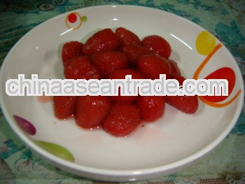 Delicious food canned strawberry fruit in syrup