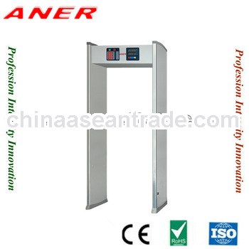Door frame metal detector for checking big metal articles, ignoring metal in belt button, shoes