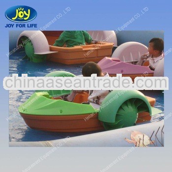 Funny games in park boats with paddle