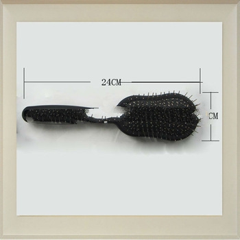 Oval hair brush with metal pins