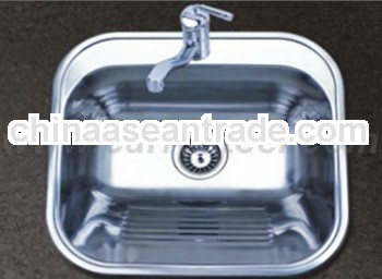 Stainless steel laundry sink with washing board inside