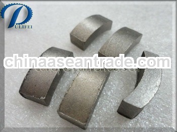 Wet working diamond core bit segment for drilling concrete