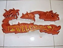 SIGNAGE WITH SURFING DOLPHIN