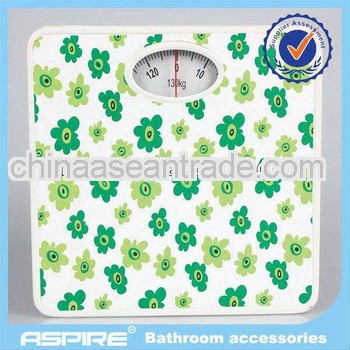 bath scale with green flower