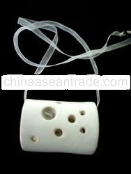 Random Perforated Tubular Ceramic Pendant