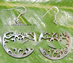 mother of pearl earring carving from bali