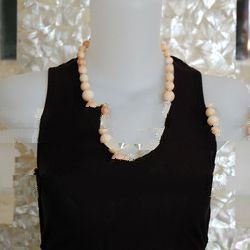 pearl mabe with shell combine with bead from shell cassis jewel