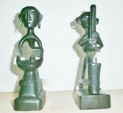 Acacia Wood Carving of Women Gathering Rice and Man Grinding Rice