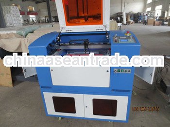 high speed desktop laser engraving machine, high quality laser engraver, engraved wedding invitation