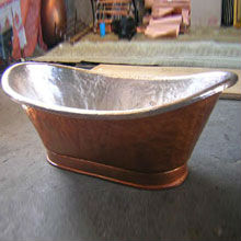 copper bathtub with silver plated interior