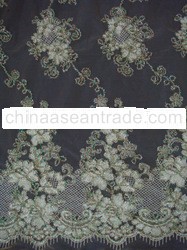 Chenille emboridery on tulle ground