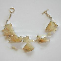 silver jewelry with turbo