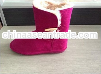 lady's red leather boots with sheep wool inside