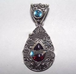 Tear Shape Pendant With Bun And Stone