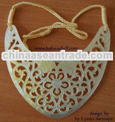 shell necklace carving art from bali style