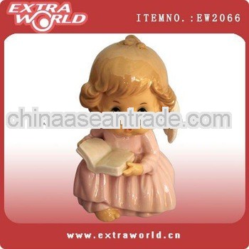 porcelain angel reading book