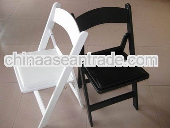 rental white resin padded folding chair