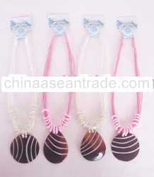 Multi Strand Cotton Necklace On Shell Resin Pendant