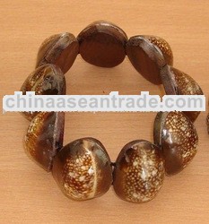 bracelet from shell cowrie tiger art natural handmade from bali indonesia
