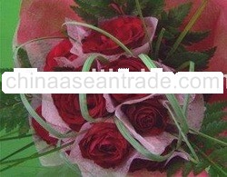 Red Rose and Bear Grass flowers decoration