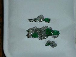 Platinum Lady's Cast Diamond And Emerald Ring