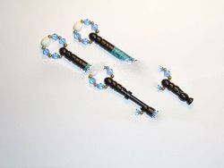 A pair of AFRICAN EBONY lace bobbins with STONE inlay