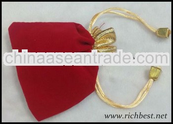 Golden fabric drawstring velvet pouch for jewelry