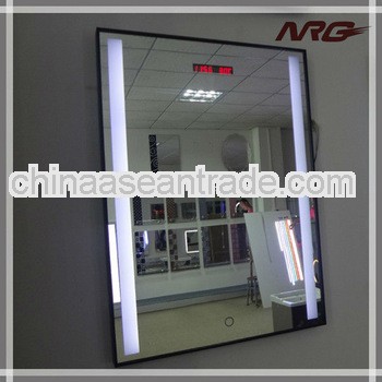 Lighted mirror with clock