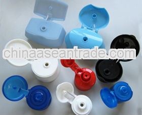 Plastic injection flip-top cap moulding for bottles