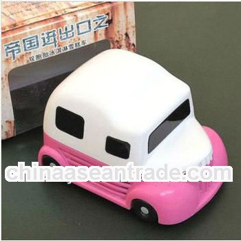 The mini cartoon car style desktop vacuum cleaner
