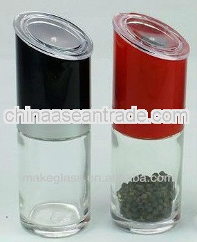 glass grinder bottle with colored cap/spice bottle
