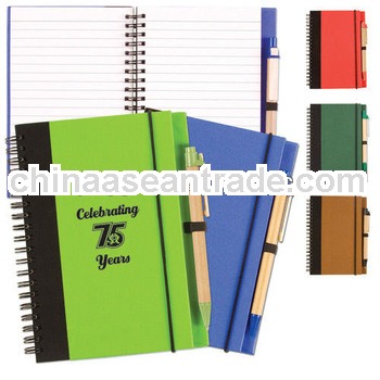 recycled spiral notebook with pen