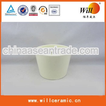 round white ceramic flowerpot
